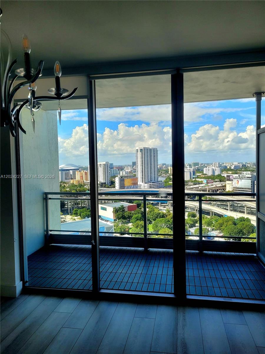 90 Southwest 3rd Street, Unit 2208 Miami, FL 33130 - Photo 15 of 56 a view of a large window with wooden floor