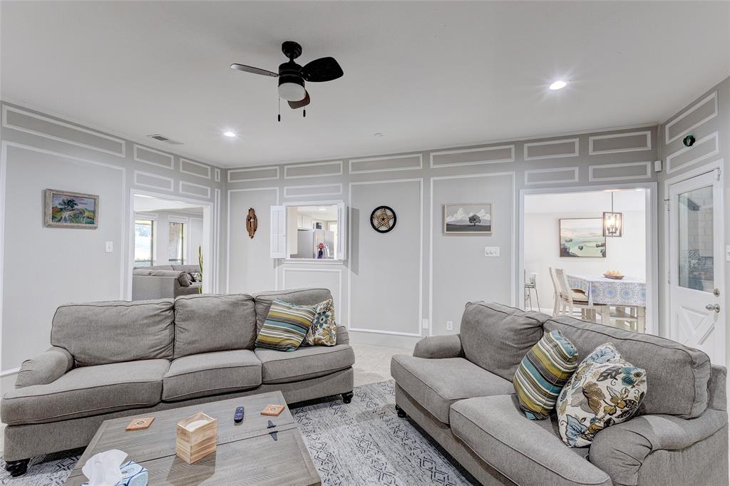 175 East Pleasant Run Road Cedar Hill, TX 75104 - Photo 32 of 39 a living room with furniture and a large window