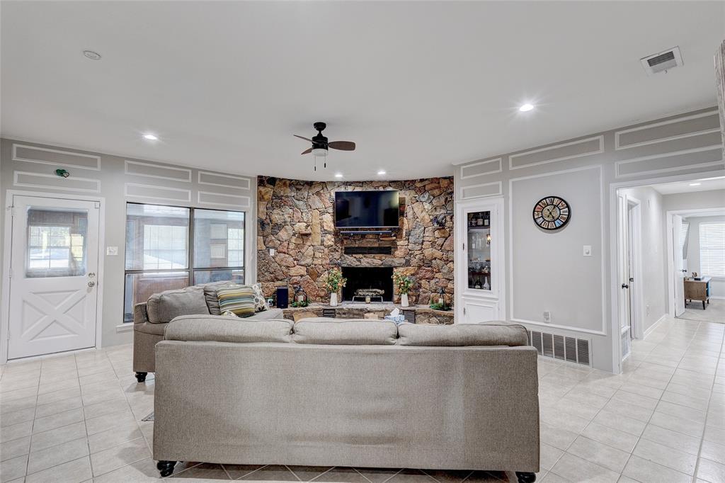 175 East Pleasant Run Road Cedar Hill, TX 75104 - Photo 34 of 39 a living room with furniture and a fireplace