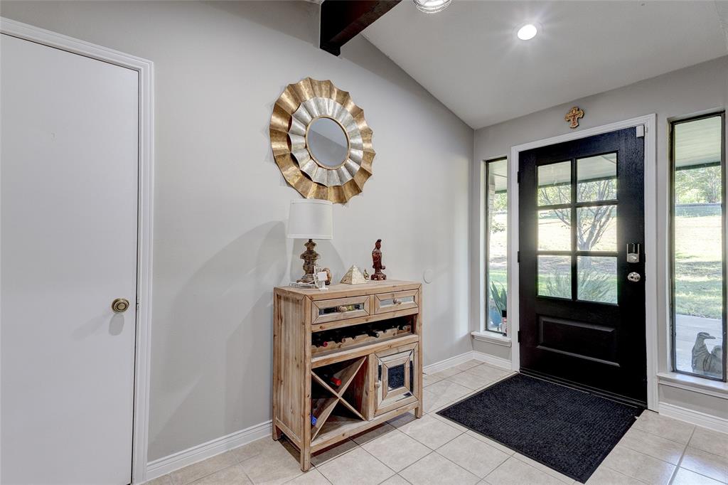 175 East Pleasant Run Road Cedar Hill, TX 75104 - Photo 37 of 39 a view of a hallway to a livingroom with furniture
