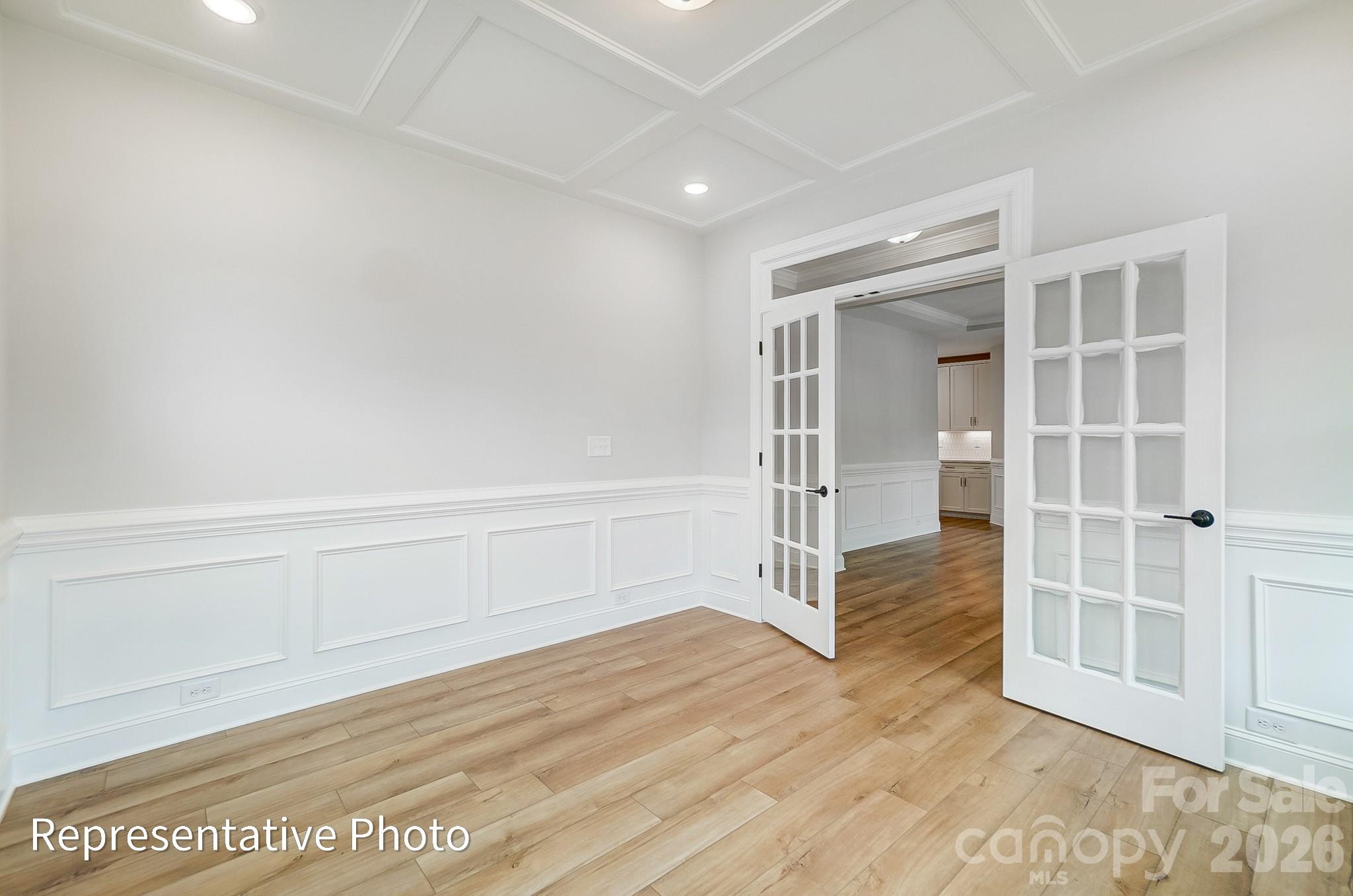 5058 Mclaughlin Loop Waxhaw, NC 28173 - Photo 27 of 42 wooden floor in an empty room