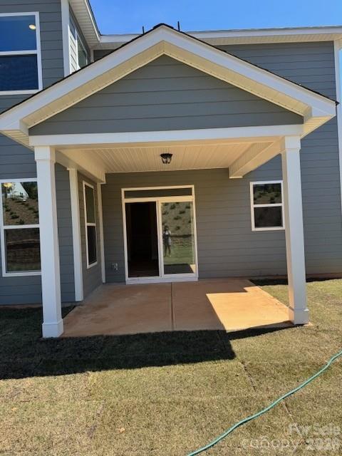 5058 Mclaughlin Loop Waxhaw, NC 28173 - Photo 10 of 42 a front view of house with yard
