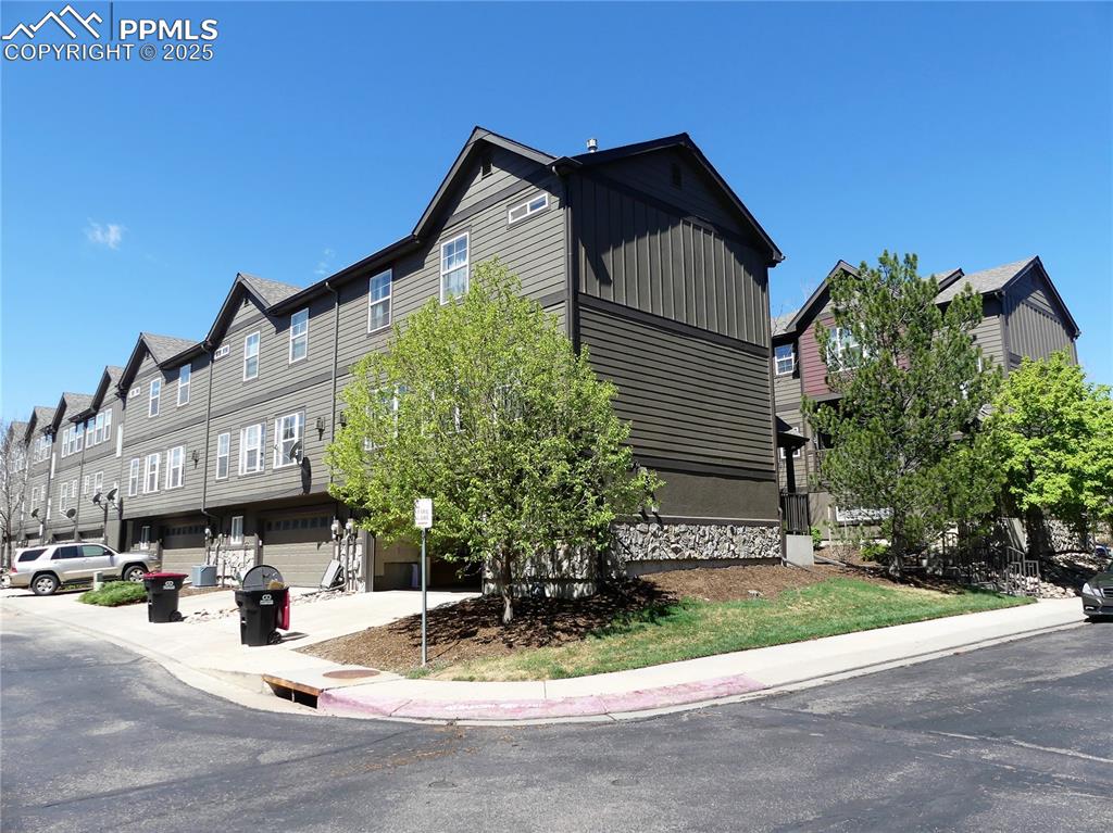 1054 Kara Ridge Point Colorado Springs, CO 80907 - Photo 32 of 33 View of front of property