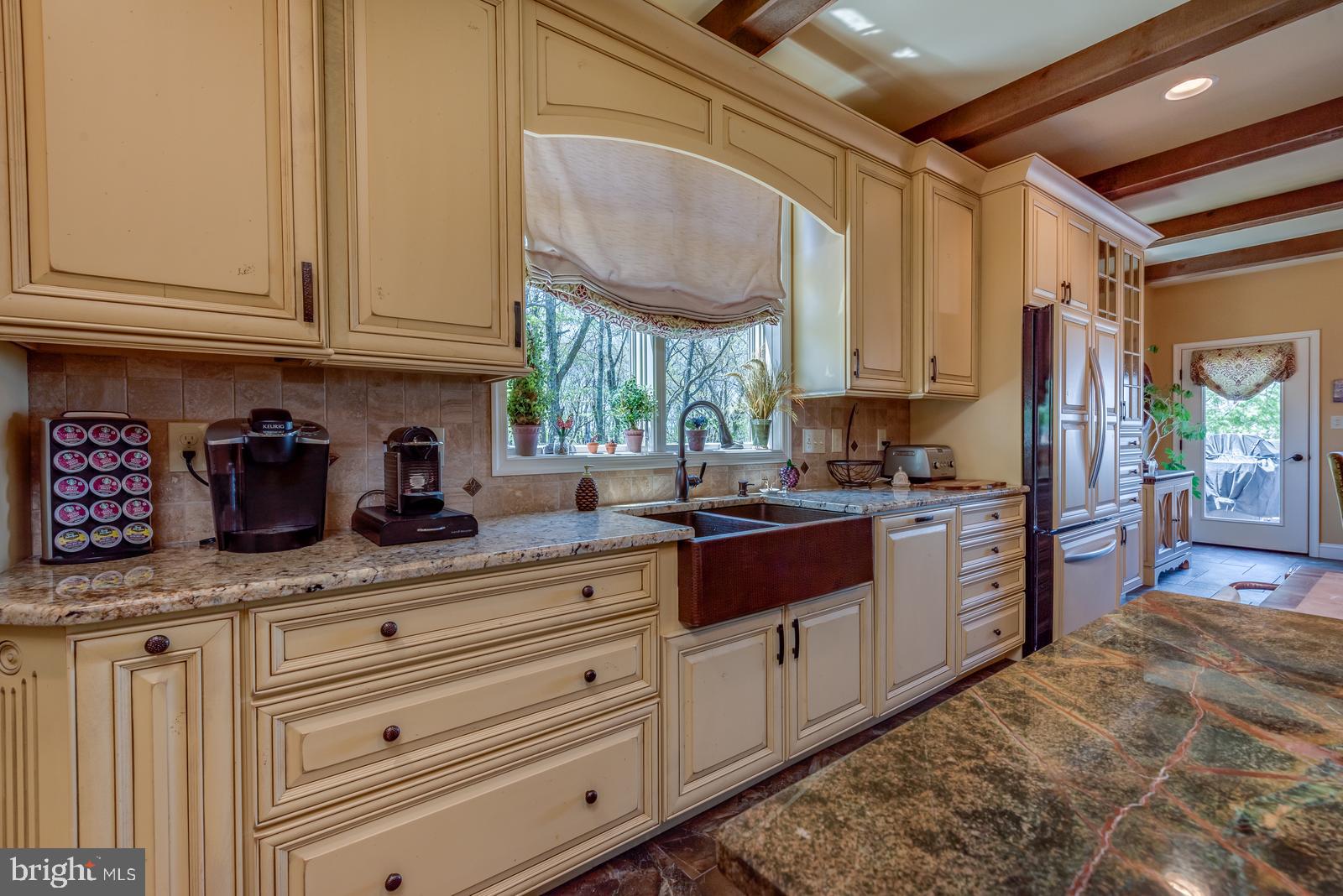 968 Scots Pne Lane Hazleton, PA 18202 - Photo 18 of 95 a kitchen with granite countertop a sink stainless steel appliances and cabinets