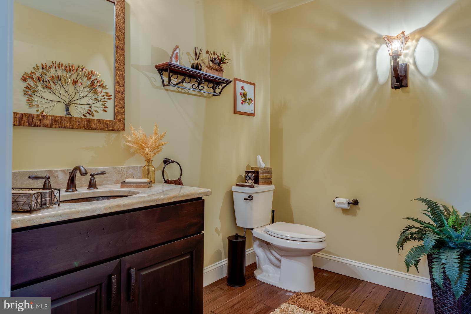 968 Scots Pne Lane Hazleton, PA 18202 - Photo 26 of 95 a bathroom with a toilet a sink and mirror