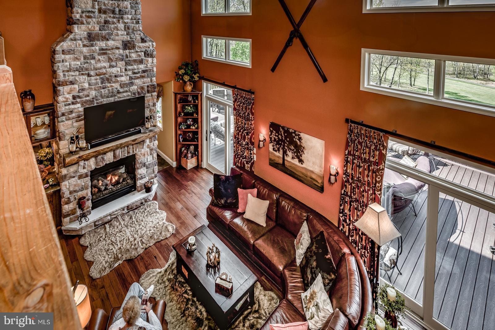 968 Scots Pne Lane Hazleton, PA 18202 - Photo 37 of 95 a living room with furniture and a fireplace