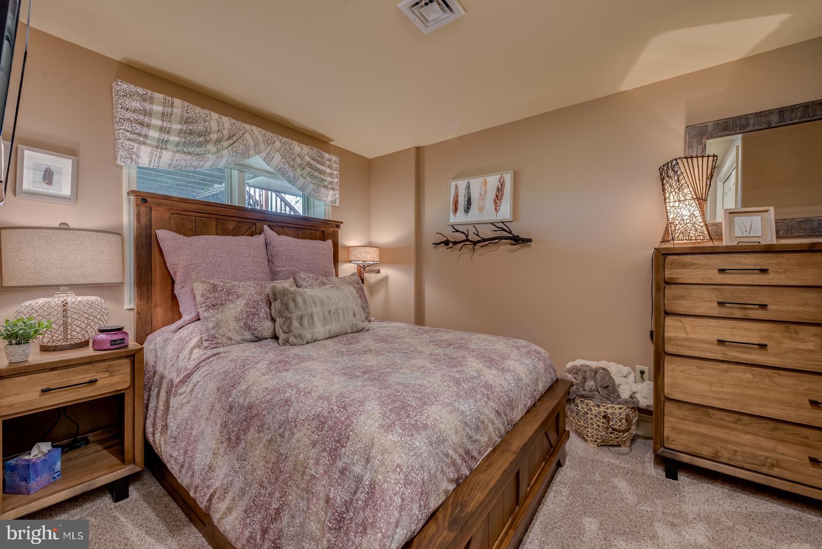 968 Scots Pne Lane Hazleton, PA 18202 - Photo 44 of 95 a bedroom with a bed and a dresser