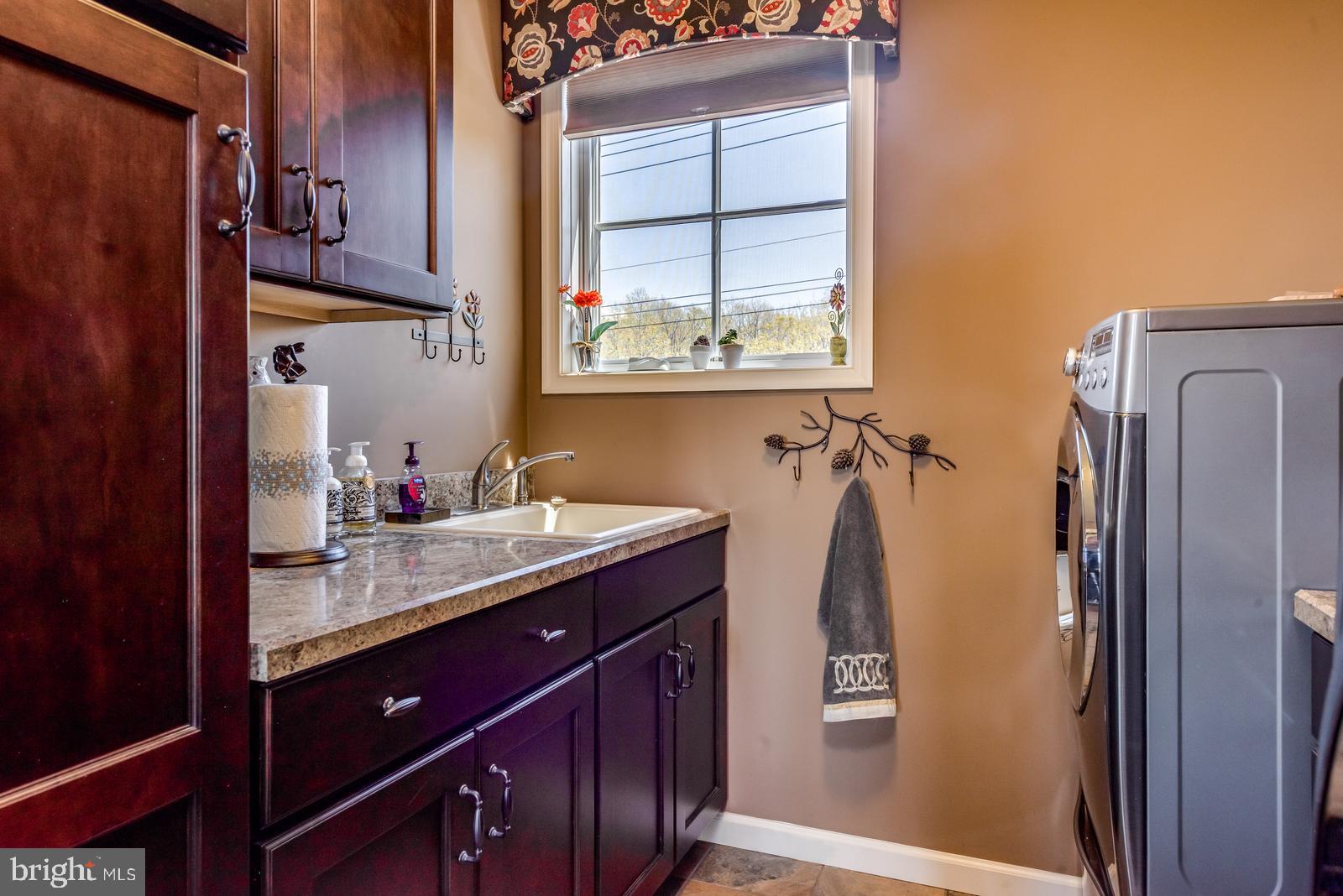 968 Scots Pne Lane Hazleton, PA 18202 - Photo 50 of 95 a bathroom with a granite countertop sink and a mirror