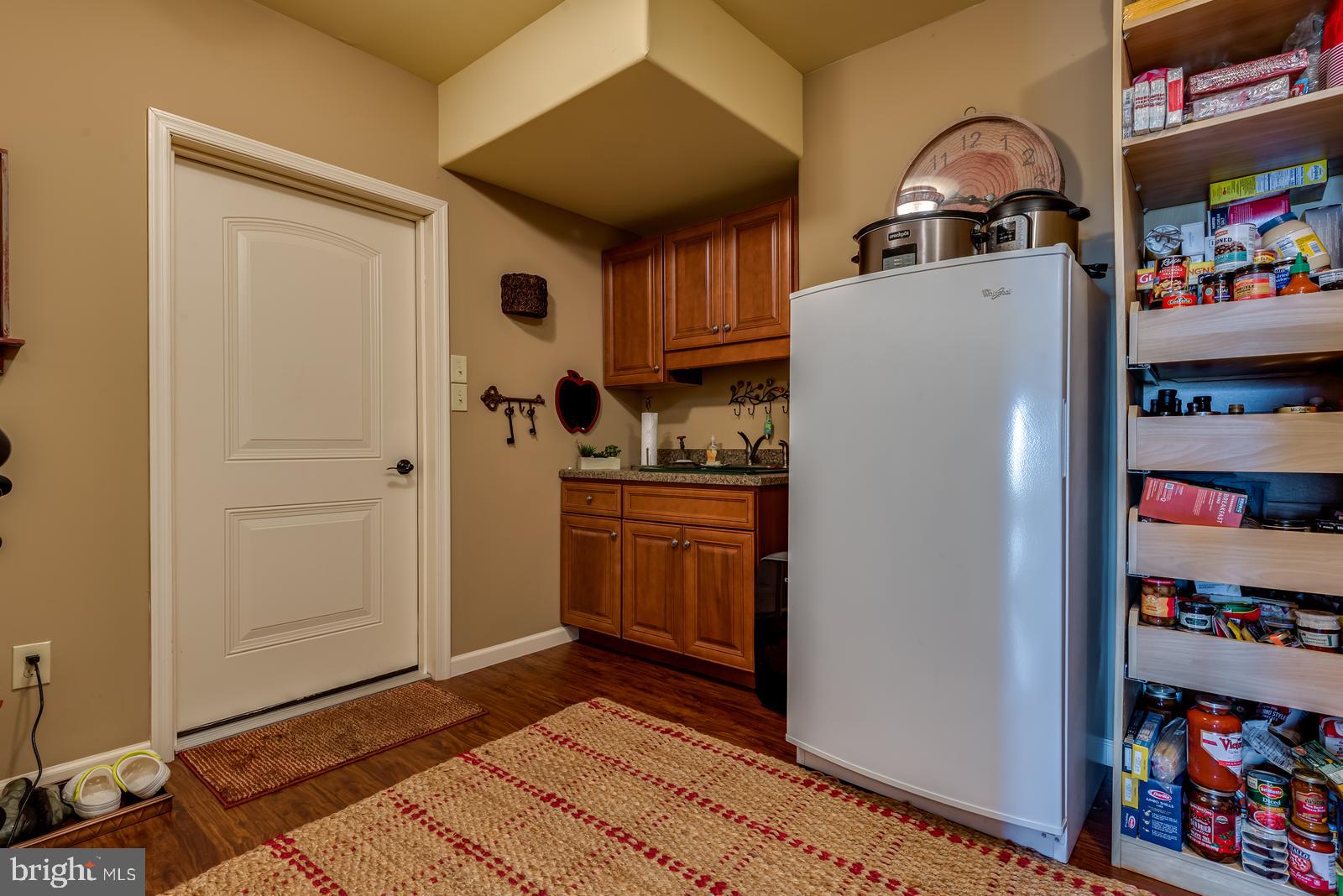 968 Scots Pne Lane Hazleton, PA 18202 - Photo 65 of 95 a kitchen with stainless steel appliances granite countertop a refrigerator and a stove