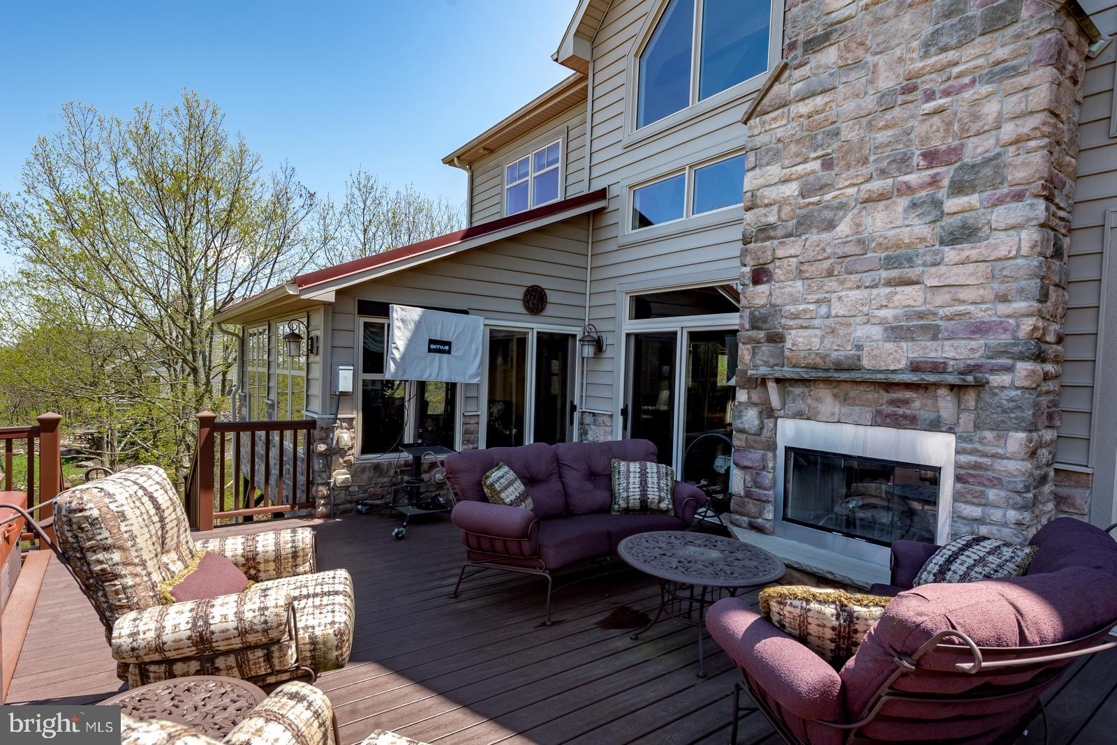 968 Scots Pne Lane Hazleton, PA 18202 - Photo 75 of 95 a outdoor living space with patio furniture and a fireplace