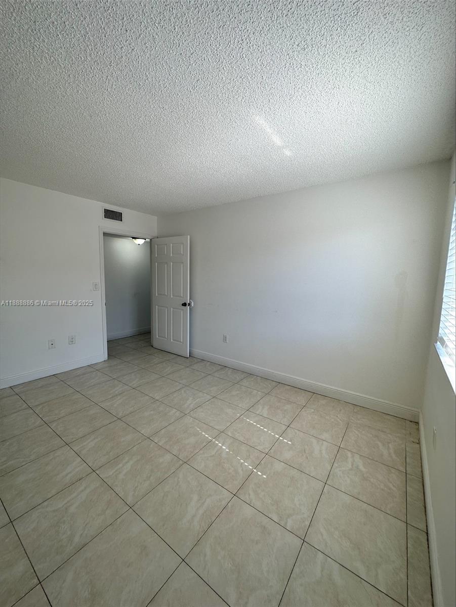6214 Southwest 131st Court, Unit 201 Miami, FL 33183 - Photo 15 of 18 a view of empty room