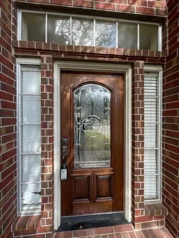 a view of a fireplace with a hallway