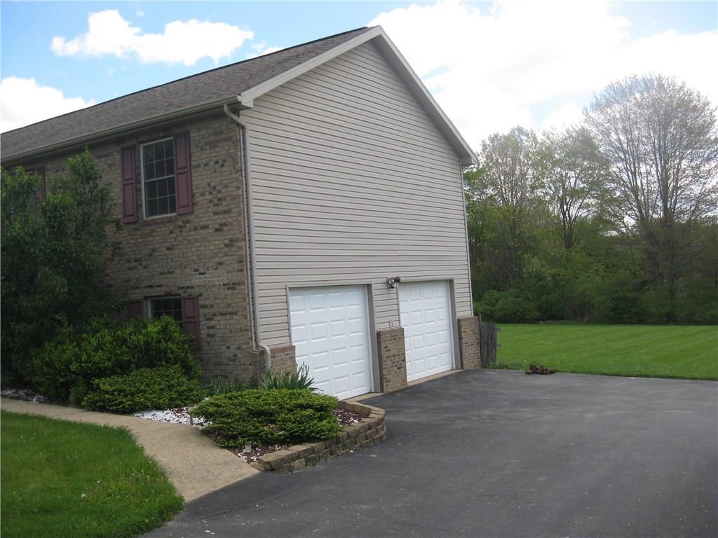 577 Slippery Rock Road Slippery Rock, PA 16057 - Photo 3 of 18 Side view; drive