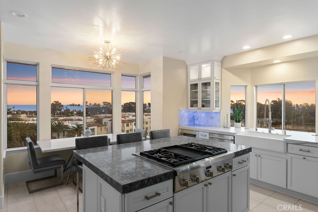 25352 Village Dana Point Dana Point, CA 92629 - Photo 8 of 41 a kitchen that has a sink and a stove