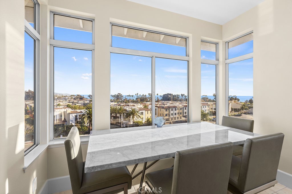 25352 Village Dana Point Dana Point, CA 92629 - Photo 9 of 41 a view of a living room with furniture and a window