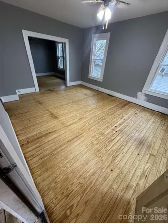 a view of an empty room and window