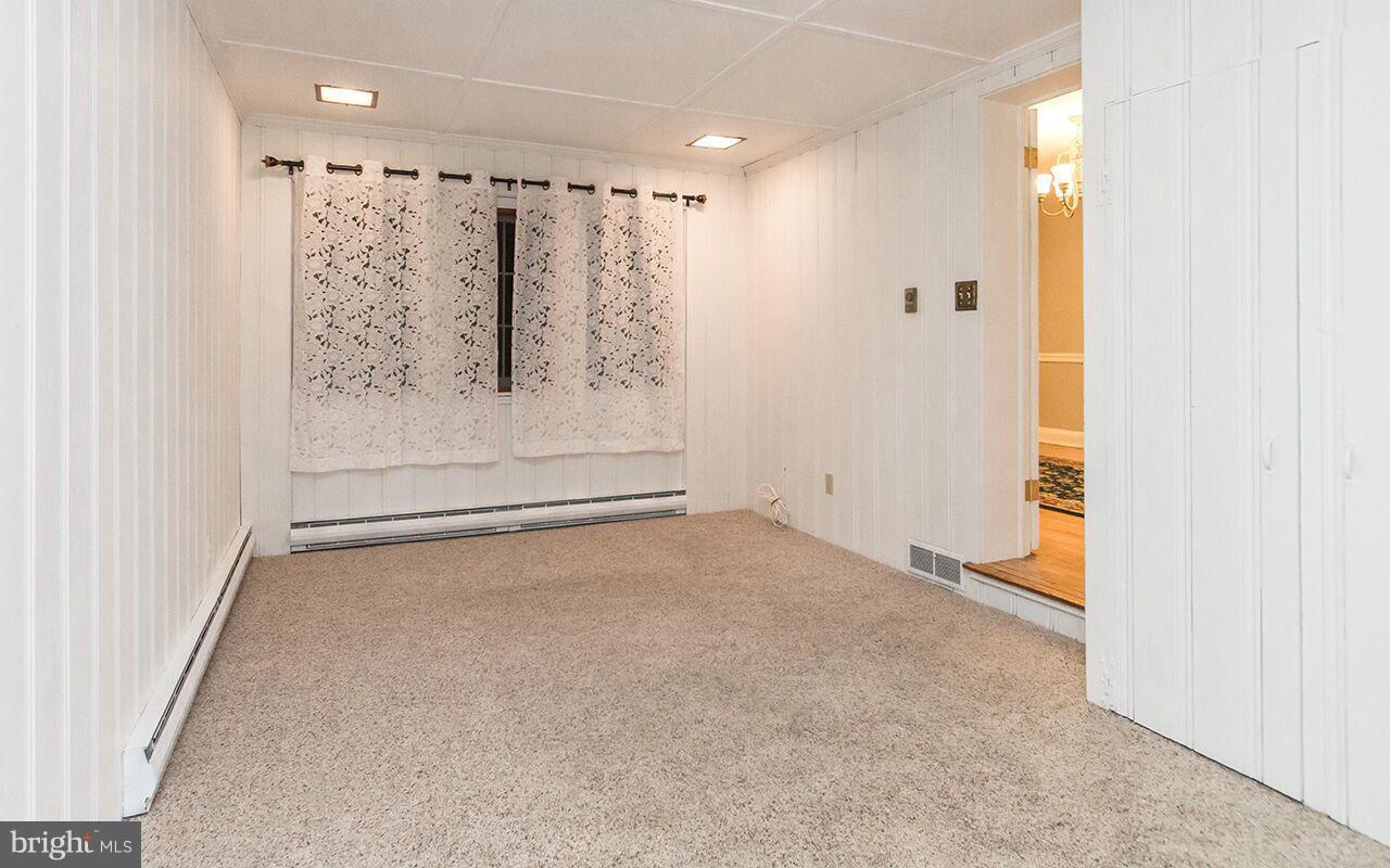 810 Olmstead Road Pikesville, MD 21208 - Photo 18 of 30 a view of an empty room