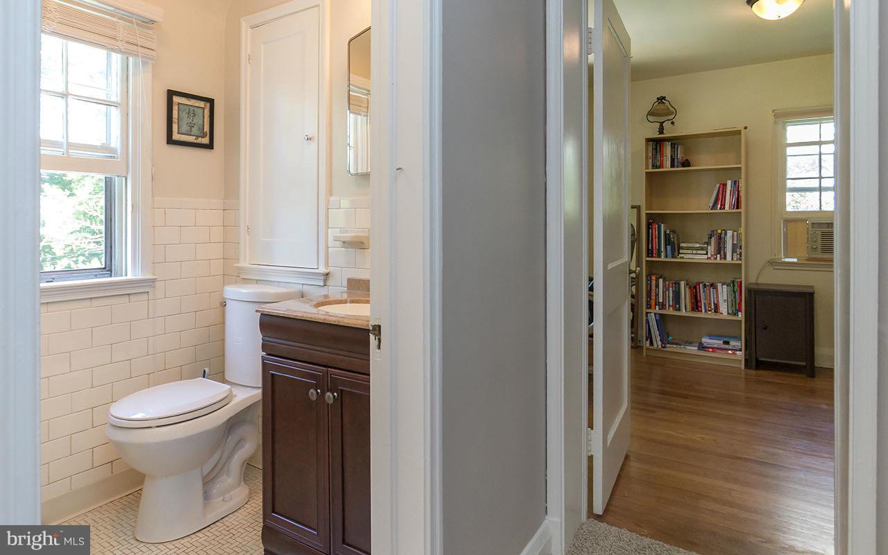 810 Olmstead Road Pikesville, MD 21208 - Photo 24 of 30 a bathroom with a toilet and a sink