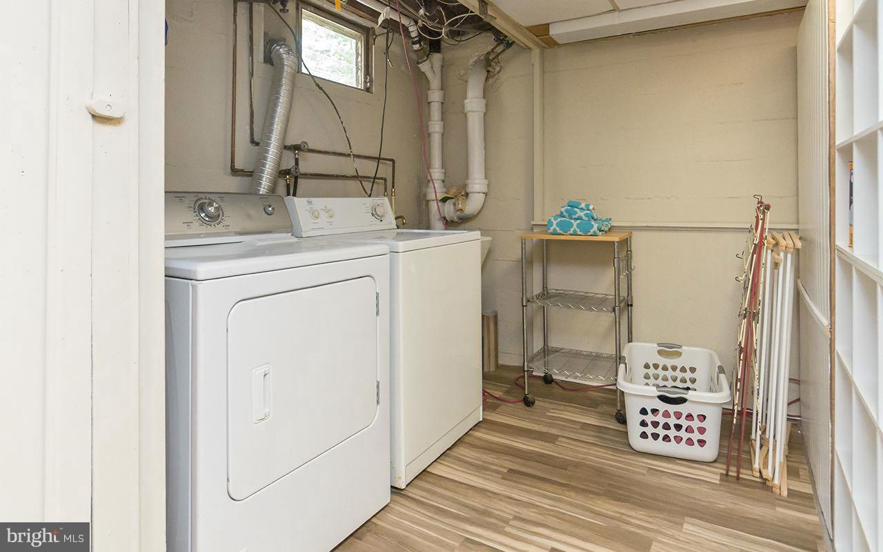 810 Olmstead Road Pikesville, MD 21208 - Photo 29 of 30 a view of bathroom with a sink and a mirror