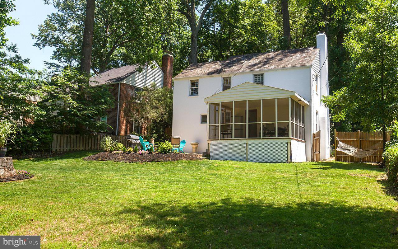 810 Olmstead Road Pikesville, MD 21208 - Photo 9 of 30 a view of a house with a yard and sitting area