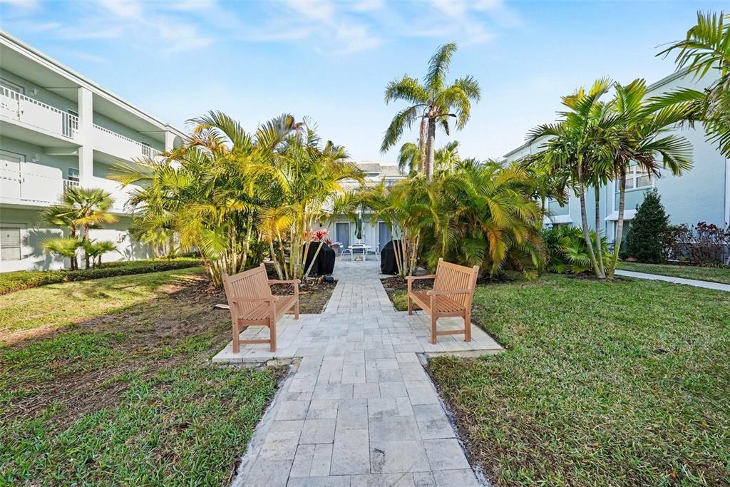 701 Poinsettia Road, Unit 240 Belleair, FL 33756 - Photo 29 of 30 a view of a garden with plants