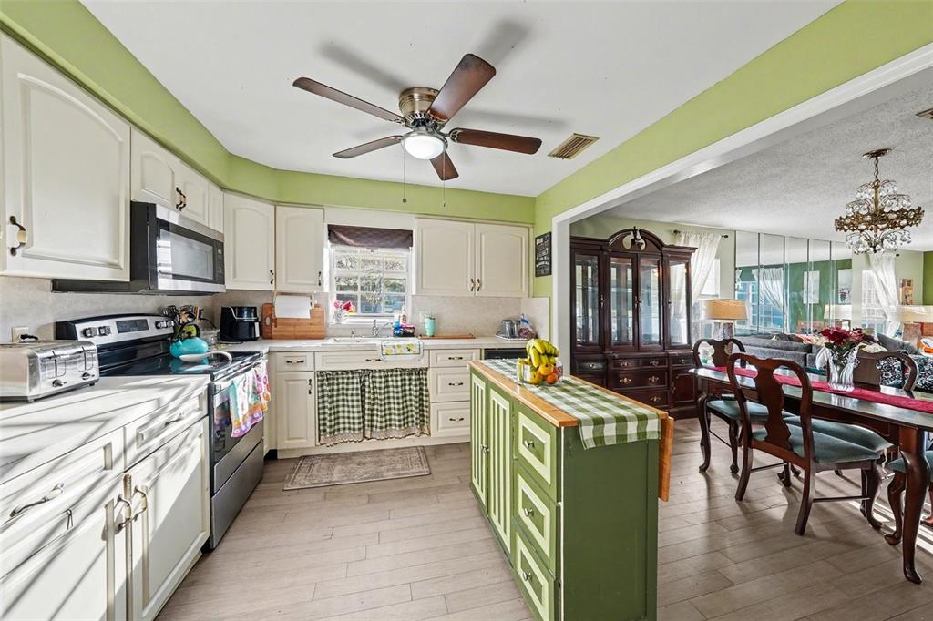 701 Poinsettia Road, Unit 240 Belleair, FL 33756 - Photo 10 of 30 a kitchen with lots of counter top space