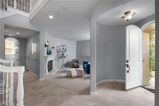 a kitchen with granite countertop a sink stove and cabinets