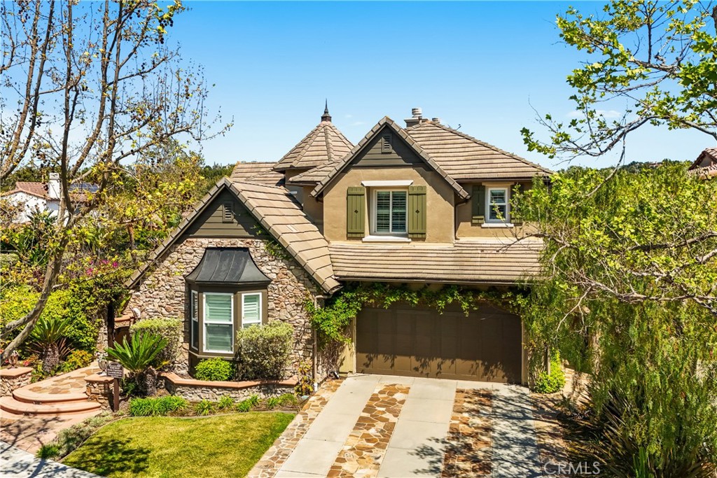 7 Waltham Road Ladera Ranch, CA 92694 - Photo 2 of 55 a front view of a house with a yard