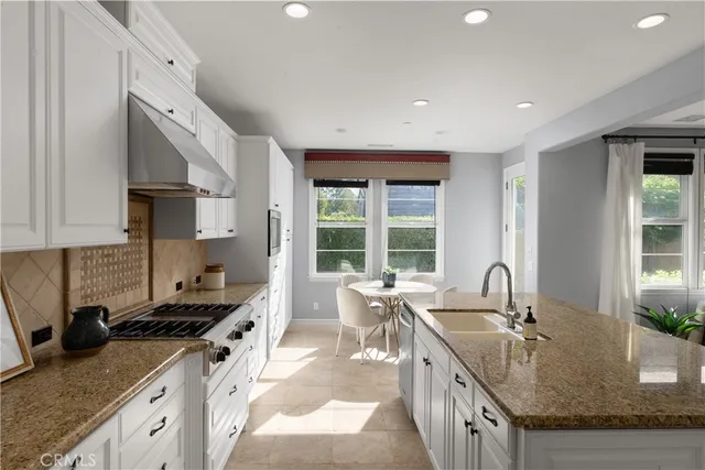 a dining room with furniture window and outside view
