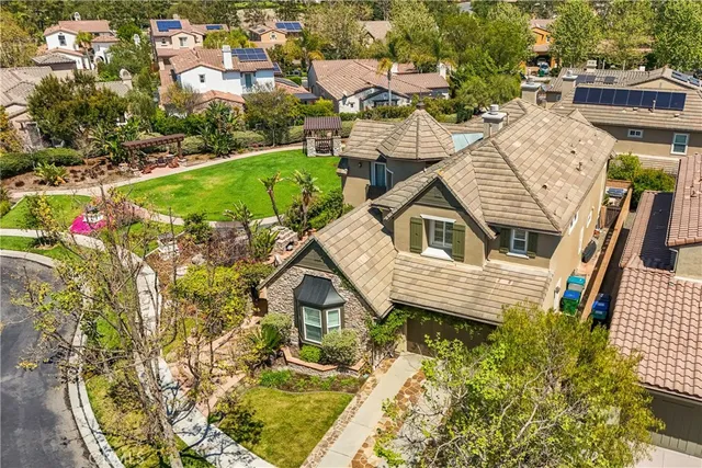 a bathroom with a sink toilet and a mirror