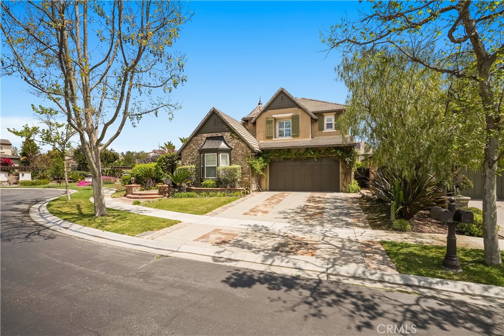 7 Waltham Road Ladera Ranch, CA 92694 - Photo 3 of 55 a front view of a house with a yard