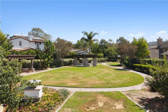 a view of balcony with wooden floor and fence