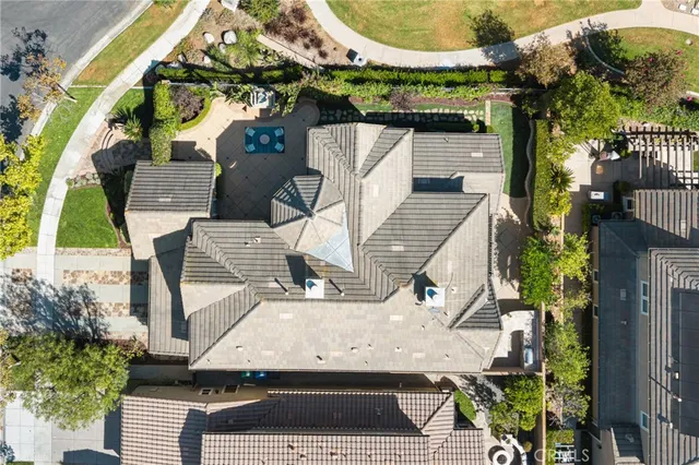 a spacious bathroom with a tub sink and mirror