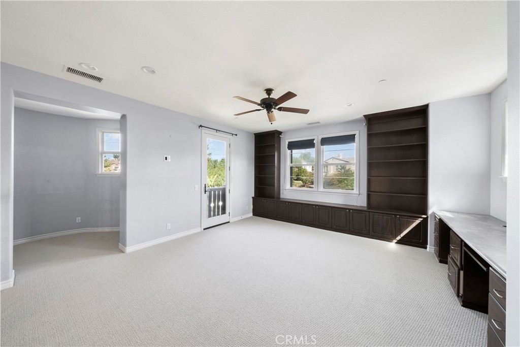 7 Waltham Road Ladera Ranch, CA 92694 - Photo 42 of 55 a view of livingroom with a ceiling fan and window