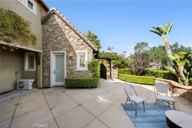 a view of a couches in patio of a house