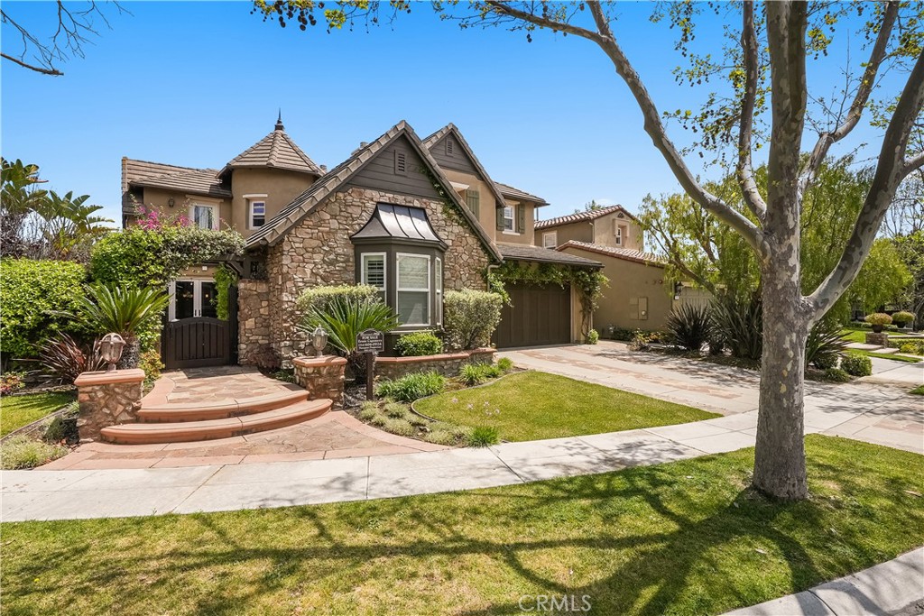 7 Waltham Road Ladera Ranch, CA 92694 - Photo 55 of 55 a front view of a house with garden