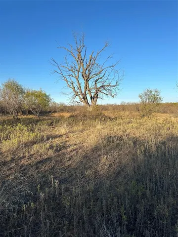 a view of lake view with mountain in the background