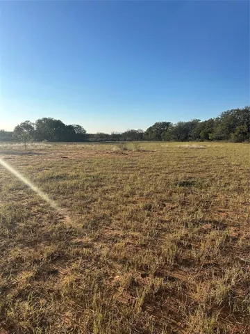 a view of lake with mountain