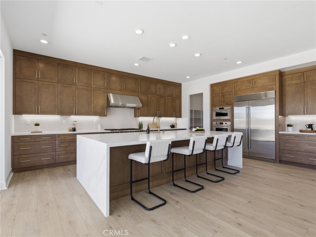 11850 Red Hawk Lane Porter Ranch, CA 91326 - Photo 10 of 51 Kitchen: Fernwood Italianate - The Ridge Collection at Bella Vista - Homesite 68