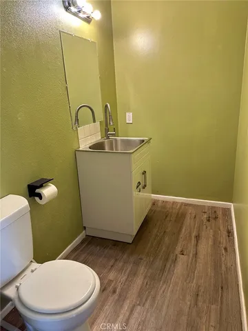 a flower plants with wooden fence