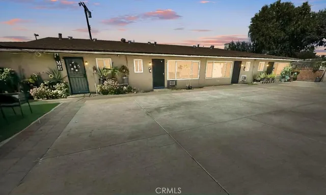an aerial view of a house with a garden