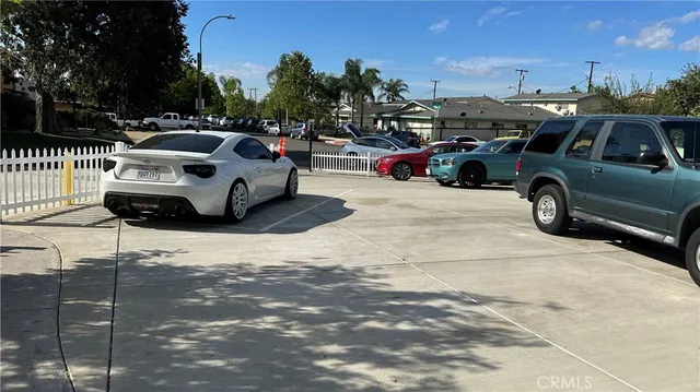 a view of cars parked in a parking lot