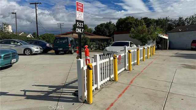 a view of a street with cars