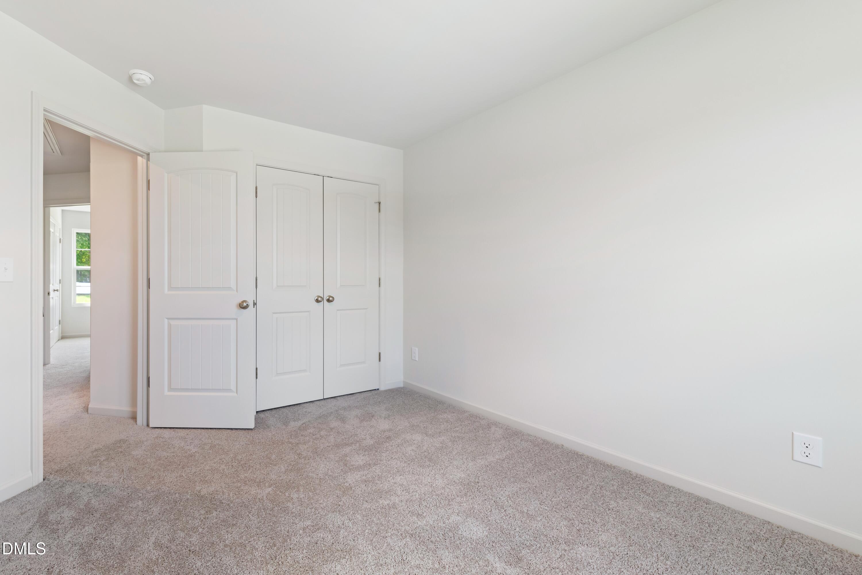 124 Starlet Ridge Way Clayton, NC 27520 - Photo 20 of 36 a view of an empty room