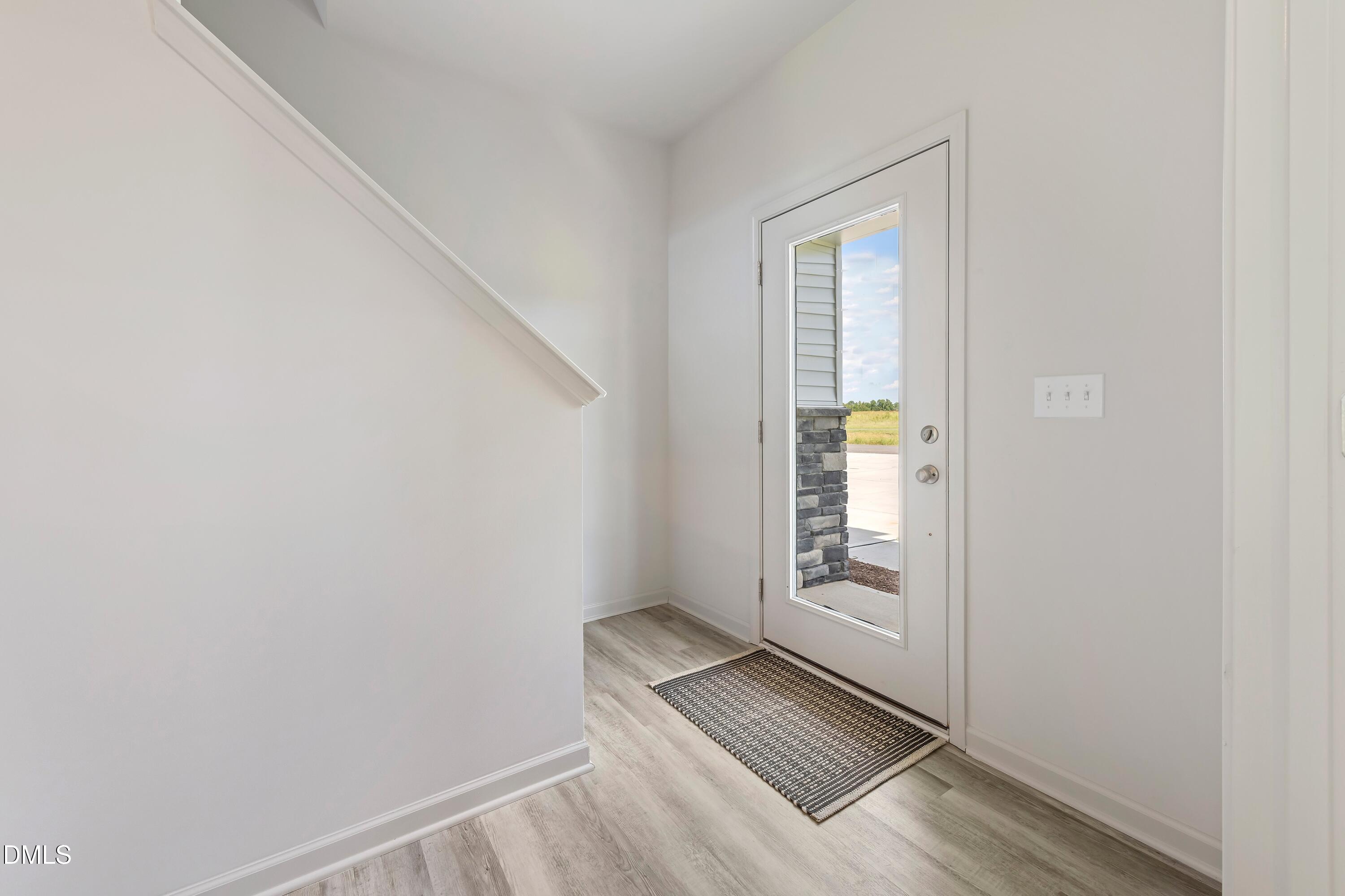 124 Starlet Ridge Way Clayton, NC 27520 - Photo 5 of 36 a view of an empty room