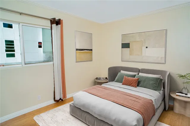 a view of a patio with a table and chairs under an umbrella