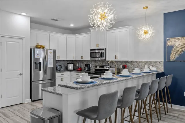 $899,990 | 1314 Birdie Way, Davenport, FL 33896