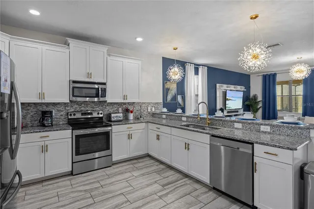 $899,990 | 1314 Birdie Way, Davenport, FL 33896