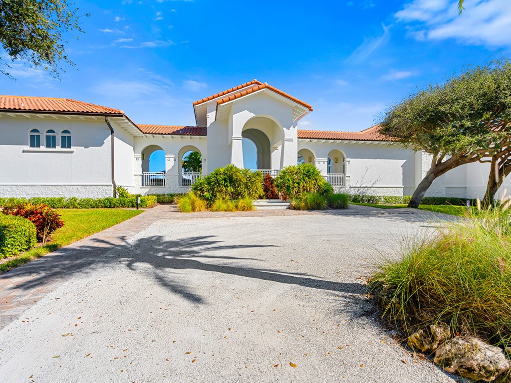 2139 Falls Circle Vero Beach, FL 32967 - Photo 15 of 17 a front view of a house with a yard