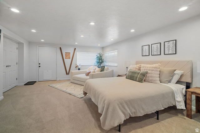 4426 South 3035 East Holladay, UT 84124 - Photo 22 of 49 Bedroom featuring light colored carpet and recessed lighting